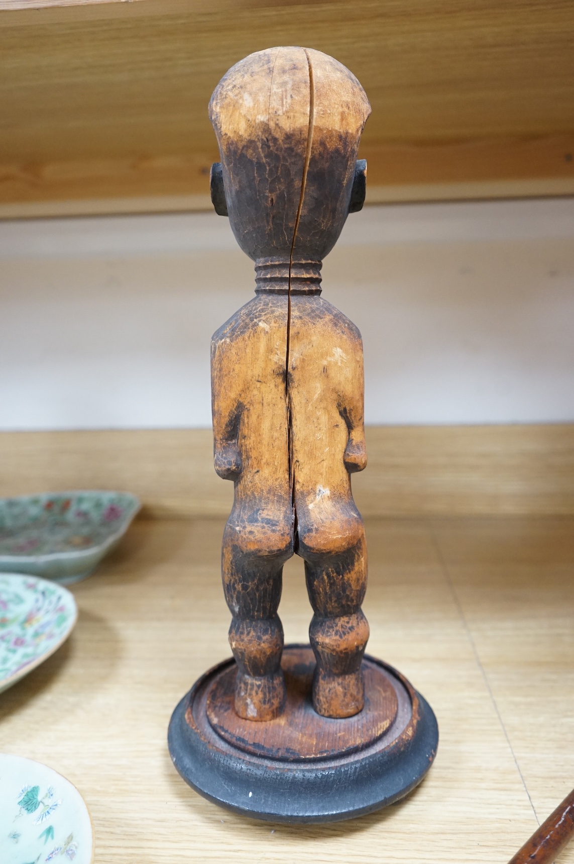 A Fang peoples female reliquary figure, Equatorial Guinea, Provenance - vendors grandfather in law brought back from Africa when working in the Gold Coast late 19th/early 20th century, on stand, 36cm high not including s